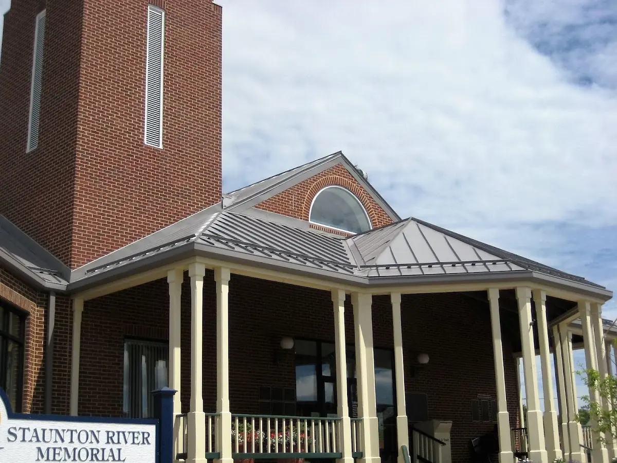 Skilled roofing craftsmen working on a residential roof in Columbus